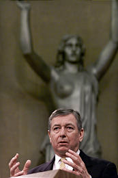 John Ashcroft Drapes Bare Breasts of Stone